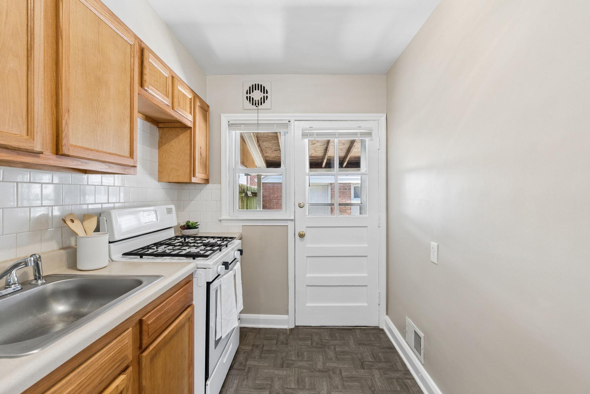 2169 Firethorn Road Baltimore, MD 21220 - Photo 24 of 53 Cozy kitchen with natural light.