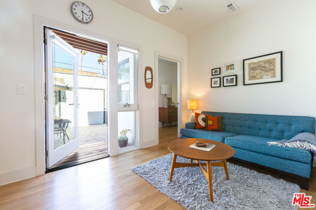 3407 Madera Avenue Los Angeles, CA 90039 - Photo 23 of 46 a living room with furniture and a rug