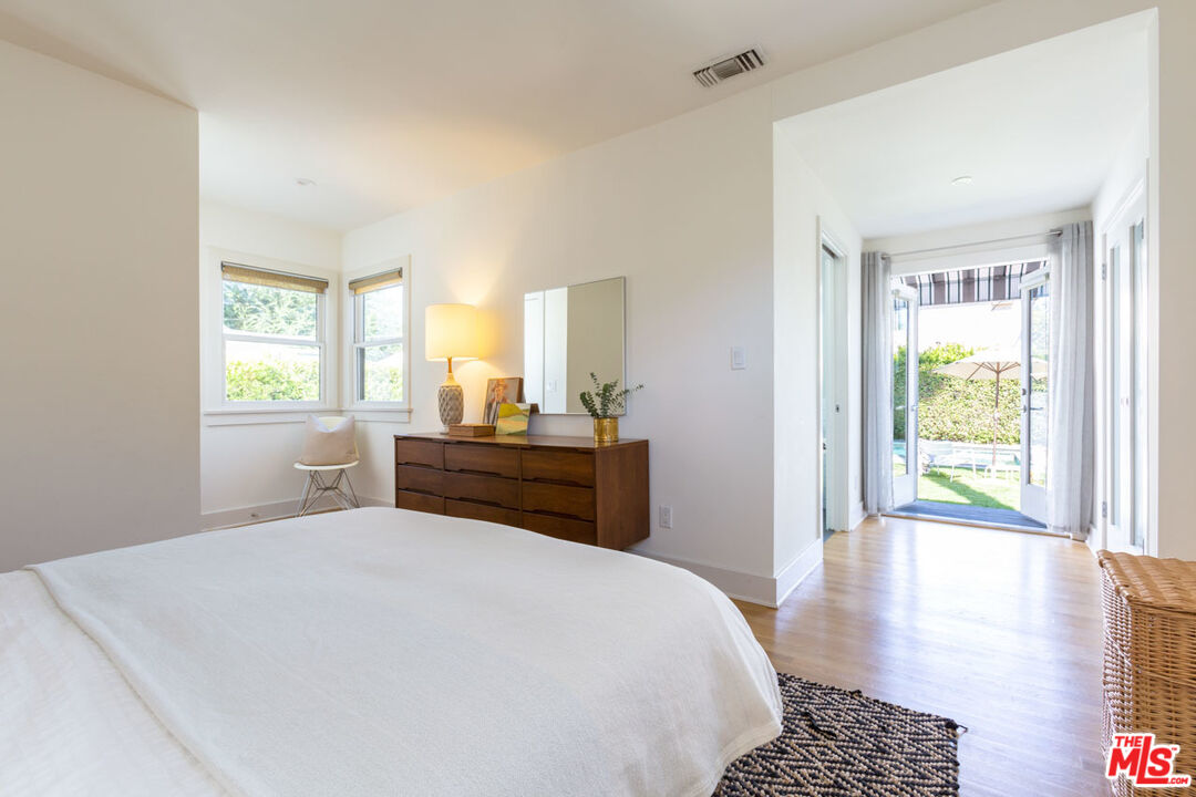 3407 Madera Avenue Los Angeles, CA 90039 - Photo 28 of 46 a bedroom with a bed and a window