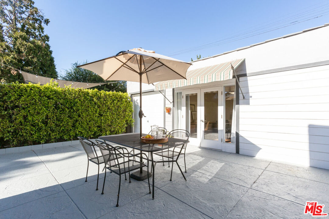 3407 Madera Avenue Los Angeles, CA 90039 - Photo 40 of 46 a table and chairs in patio