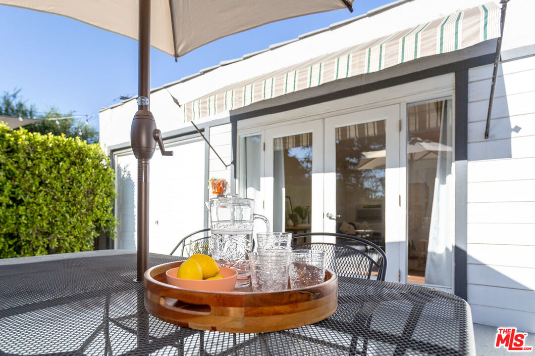 3407 Madera Avenue Los Angeles, CA 90039 - Photo 41 of 46 a view of a dining room with a table and chairs