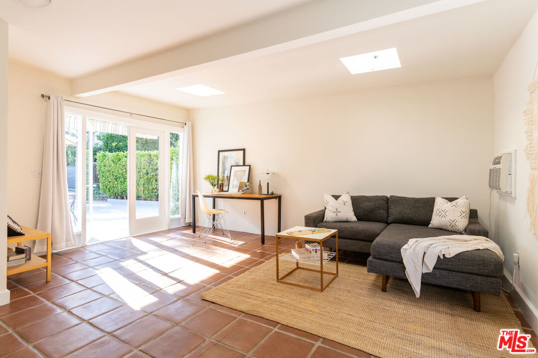 3407 Madera Avenue Los Angeles, CA 90039 - Photo 43 of 46 a living room with furniture and a window