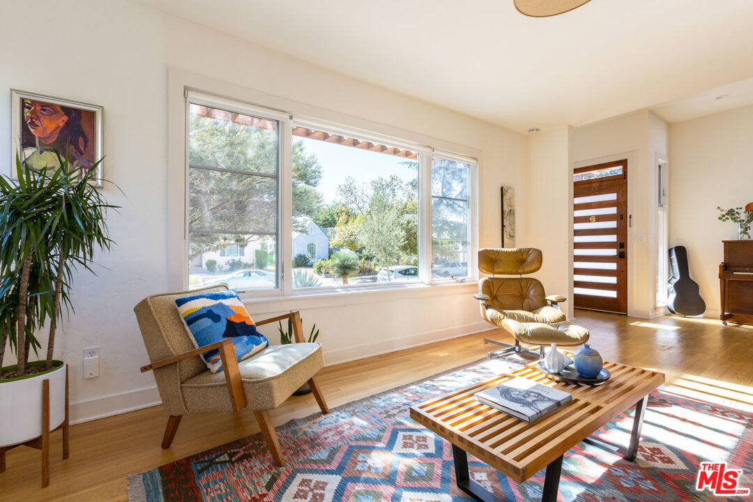 3407 Madera Avenue Los Angeles, CA 90039 - Photo 8 of 46 a living room with furniture and a large window