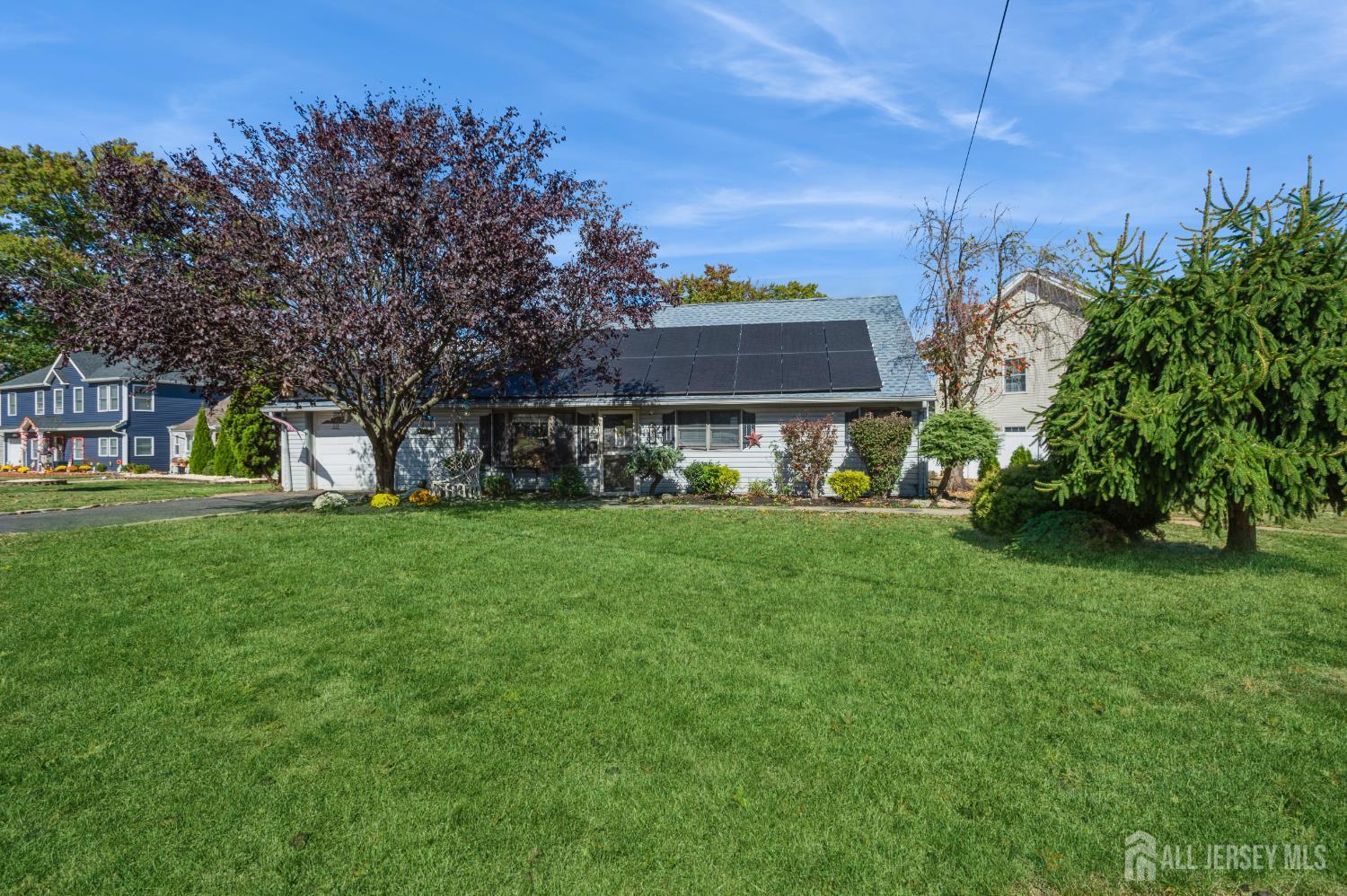 23 Colfax Road Edison, NJ 08817 - Photo 2 of 13 a view of a garden with a building in the background