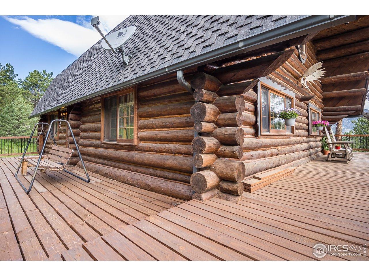 49 Moose Road Lyons, CO 80540 - Photo 14 of 40 a view of backyard with wooden deck