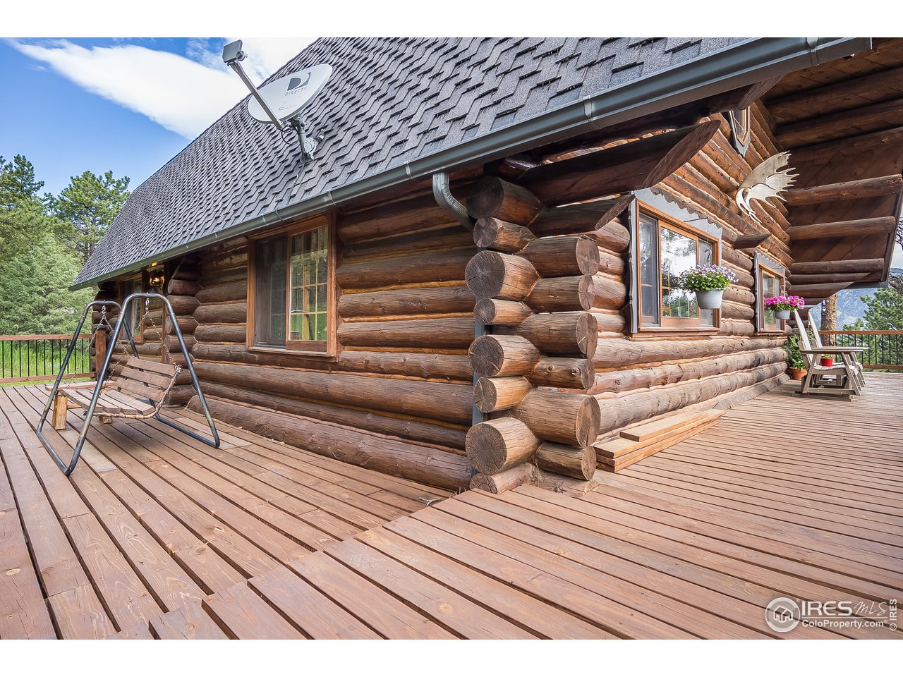 49 Moose Road Lyons, CO 80540 - Photo 15 of 40 a view of backyard with wooden deck