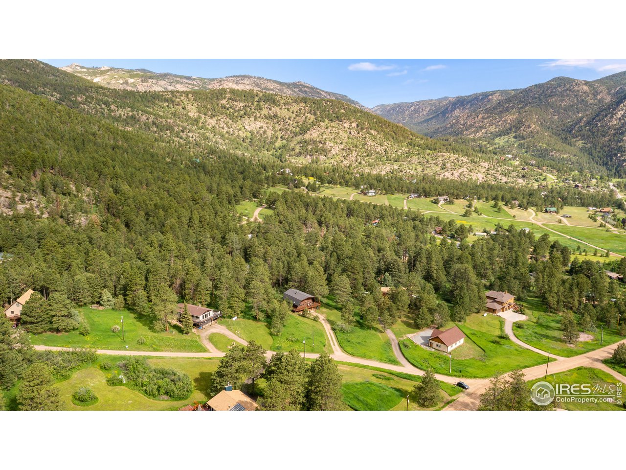 49 Moose Road Lyons, CO 80540 - Photo 19 of 40 a black and white photo of a lake