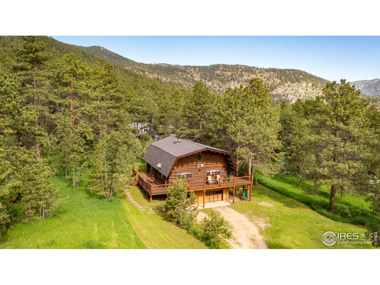 49 Moose Road Lyons, CO 80540 - Photo 2 of 40 a balcony with furniture and city view