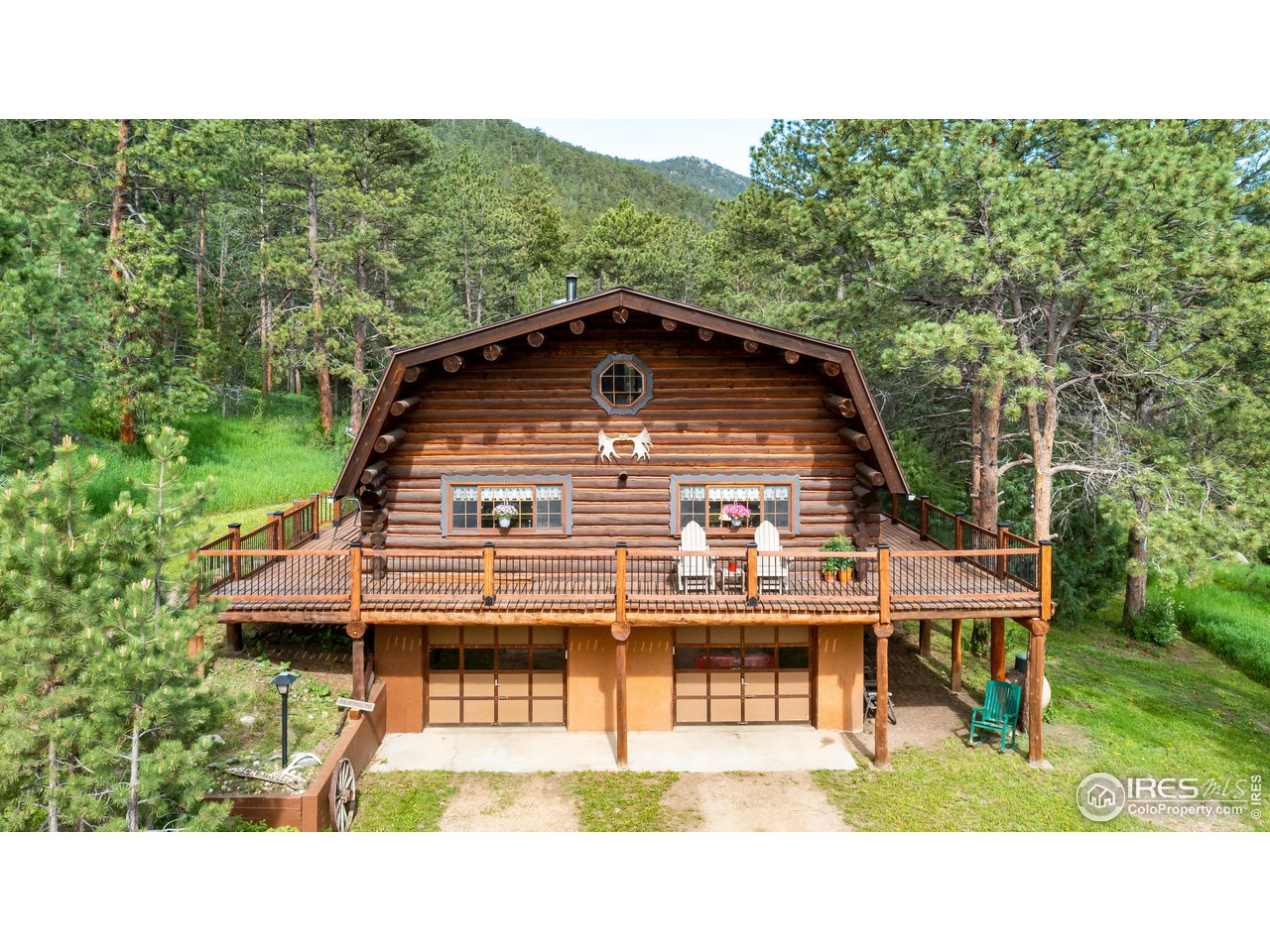 49 Moose Road Lyons, CO 80540 - Photo 3 of 40 a house view with a garden space