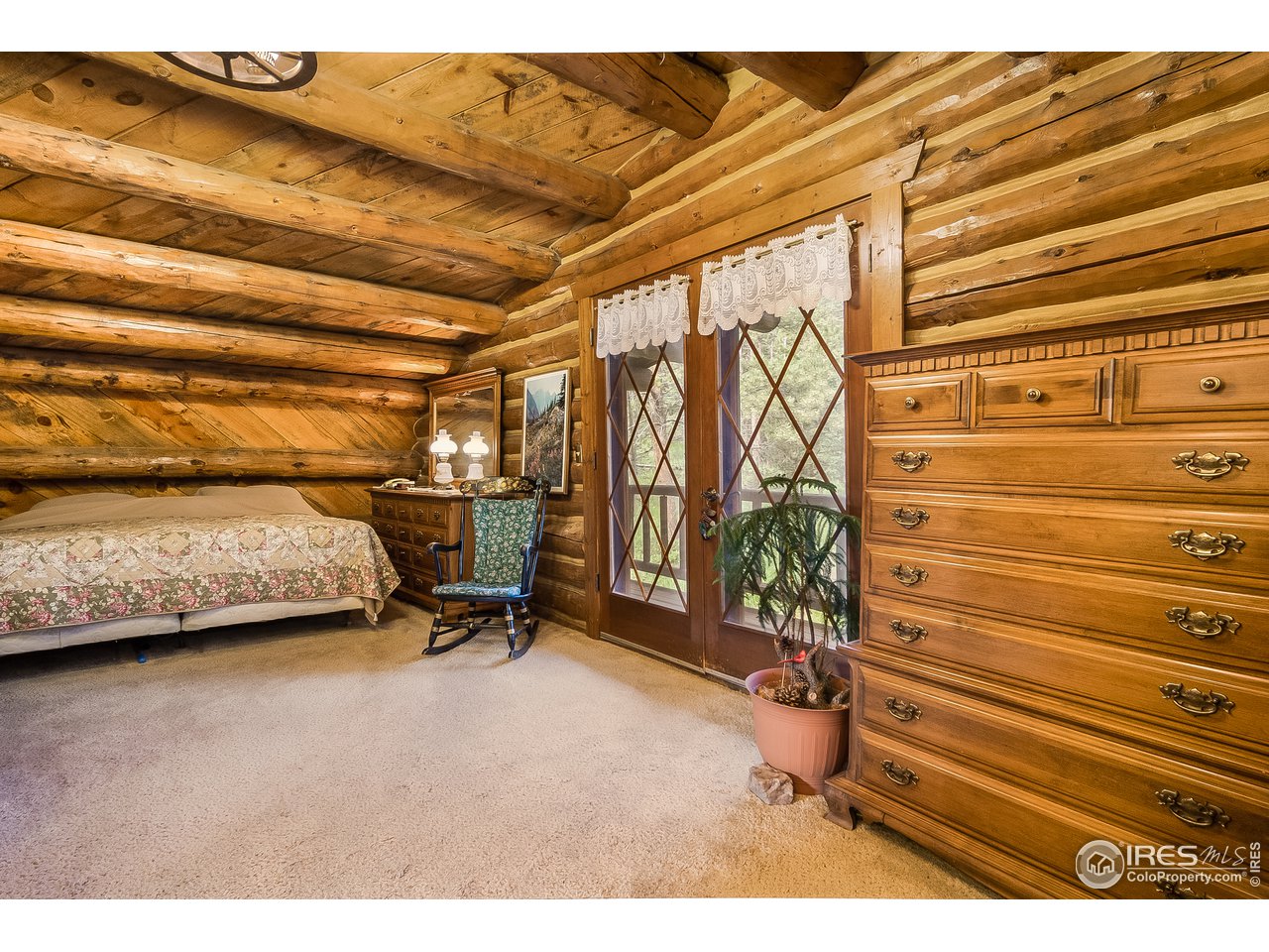 49 Moose Road Lyons, CO 80540 - Photo 34 of 40 a view of a room with gym equipment