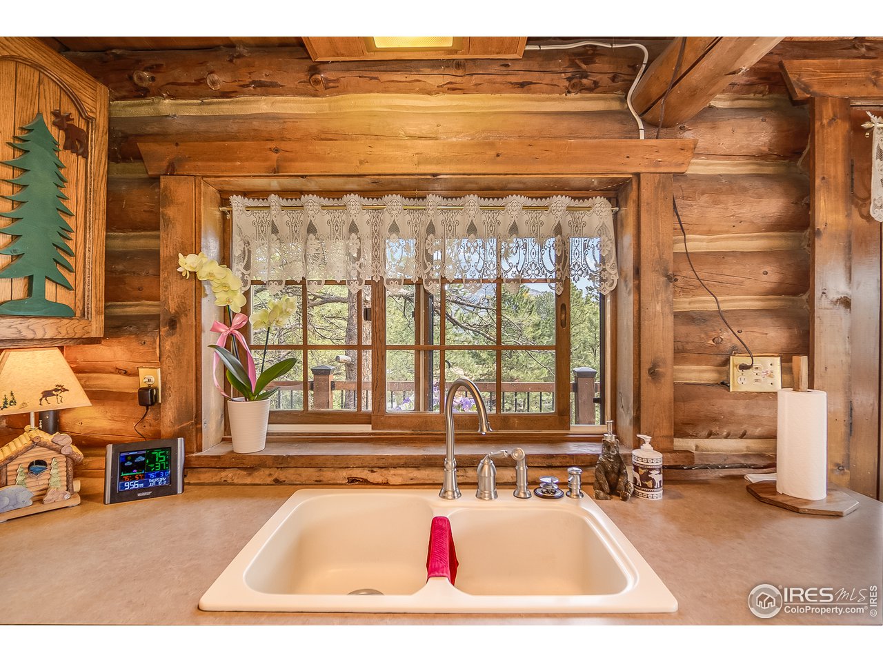 49 Moose Road Lyons, CO 80540 - Photo 6 of 40 a view of a swimming pool with outdoor seating