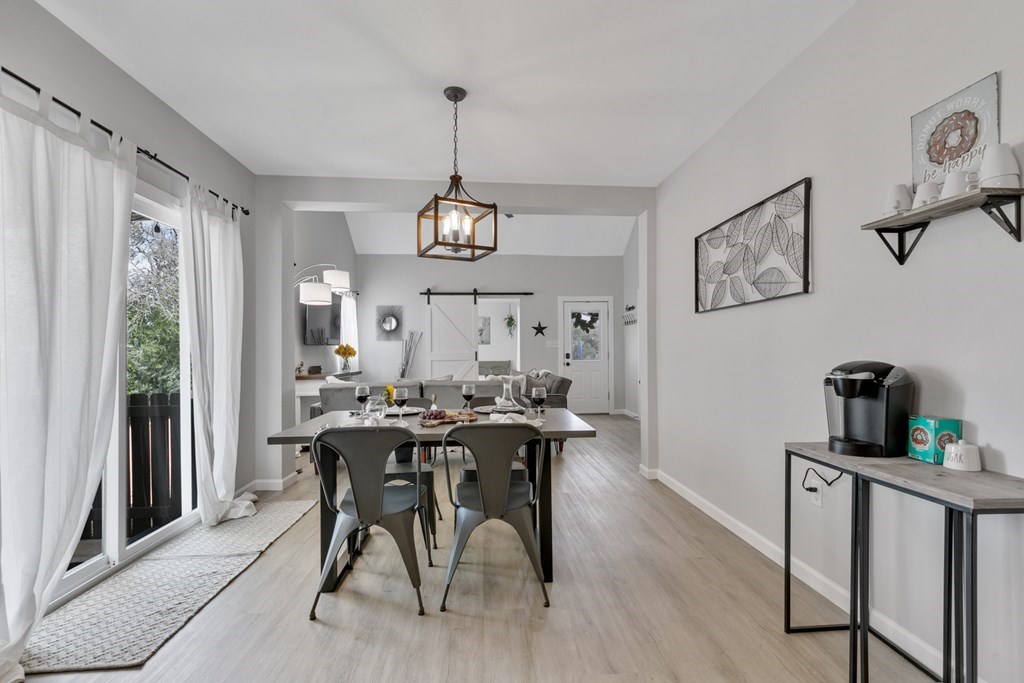 271 North Third Street Harper, TX 78631 - Photo 6 of 19 a view of a dining room with furniture window and wooden floor