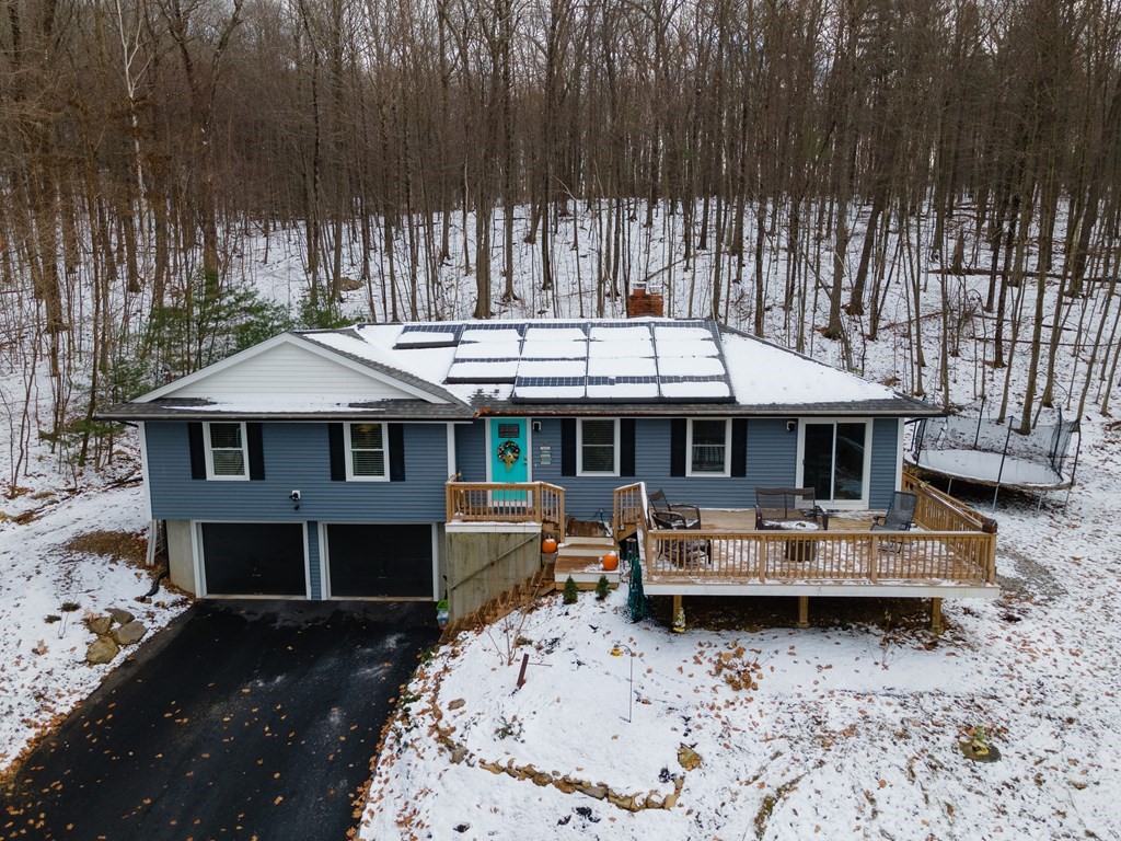 16 Vinton Road Holland, MA 01521 - Photo 2 of 32 a view of a house with wooden deck and furniture