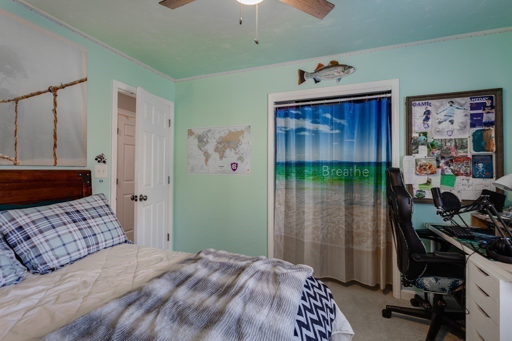 16 Vinton Road Holland, MA 01521 - Photo 21 of 32 a bedroom with a bed and a window