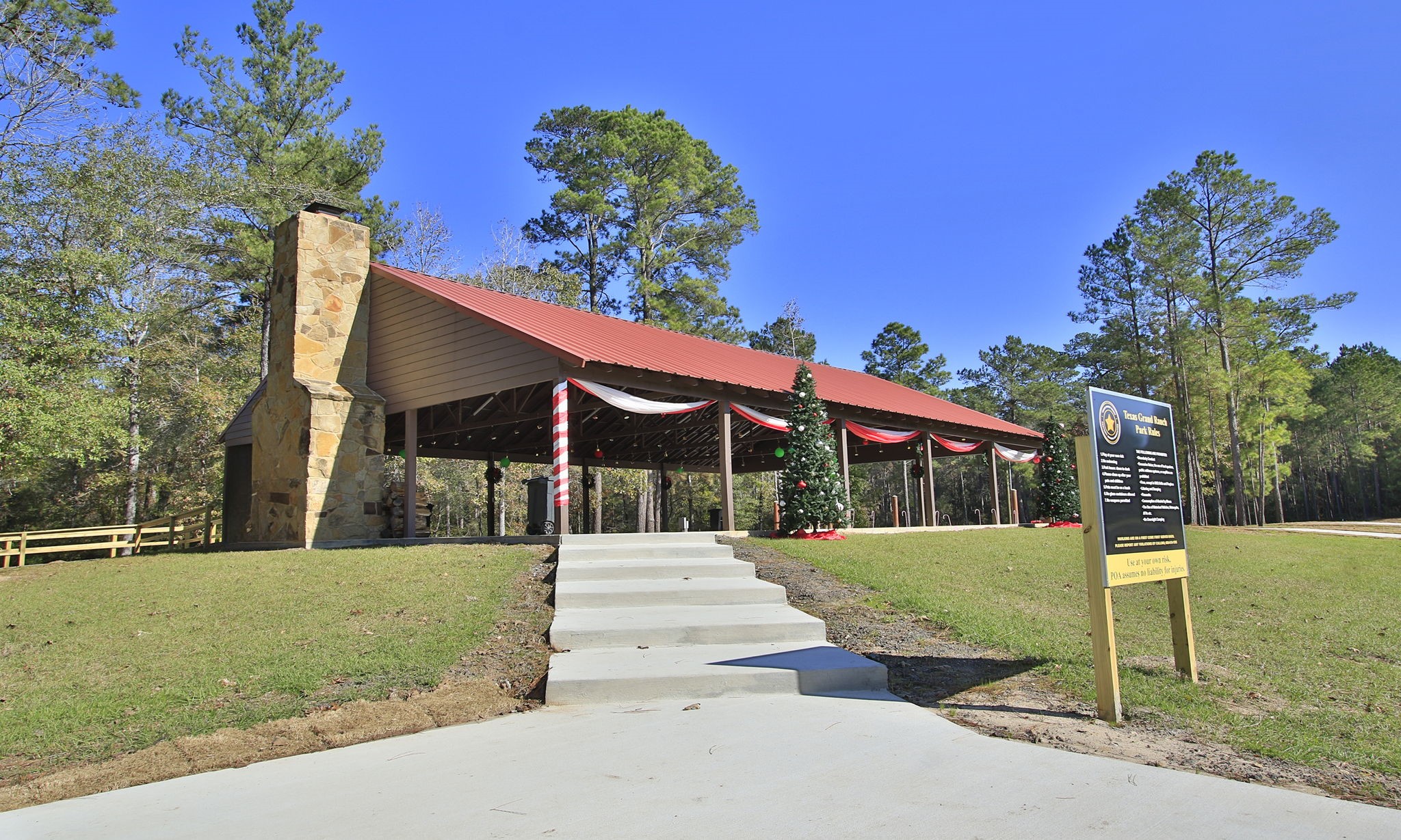 12-22-58 Grey Feather Road Huntsville, TX 77340 - Photo 13 of 21 a view of a house with a yard