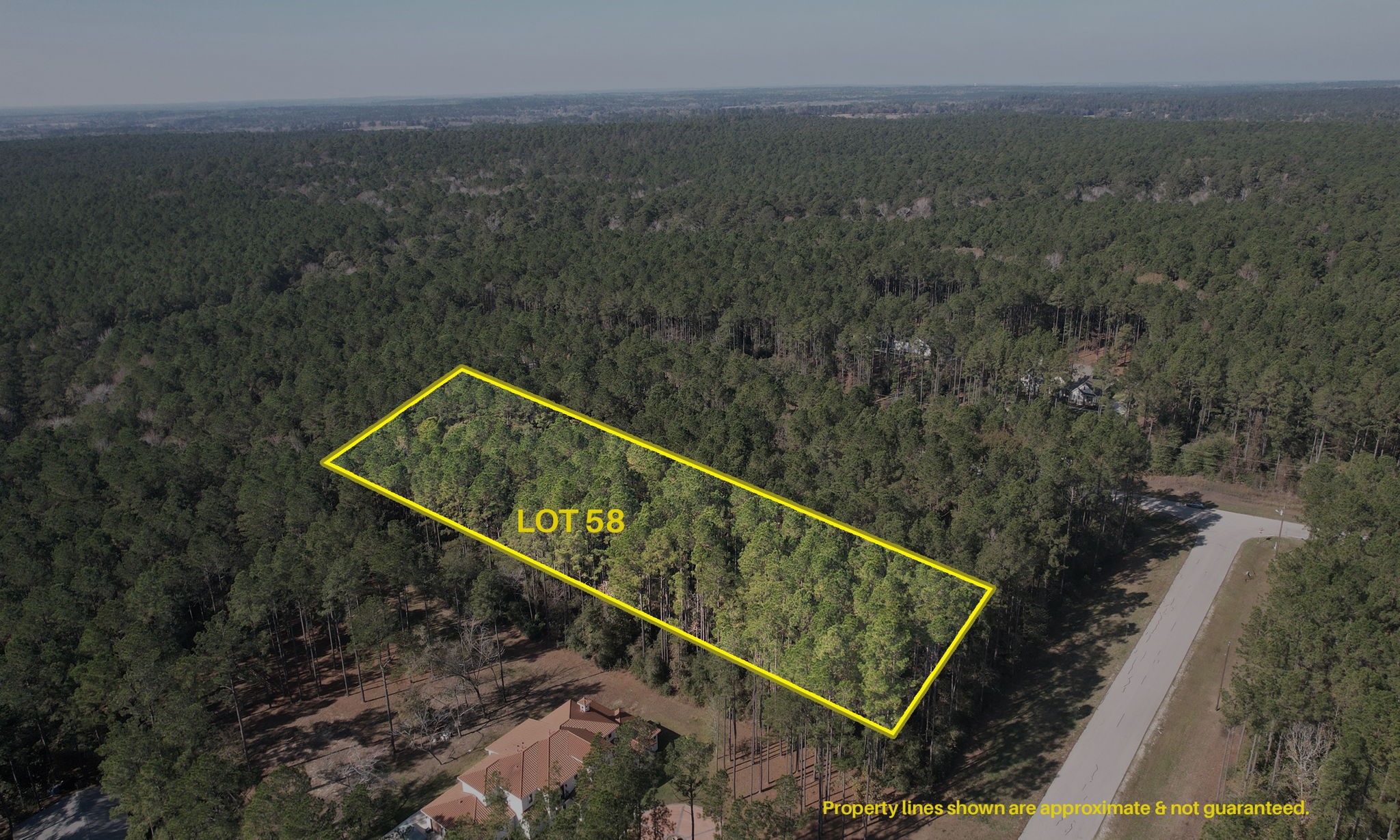 12-22-58 Grey Feather Road Huntsville, TX 77340 - Photo 2 of 21 a view of a balcony with an outdoor space