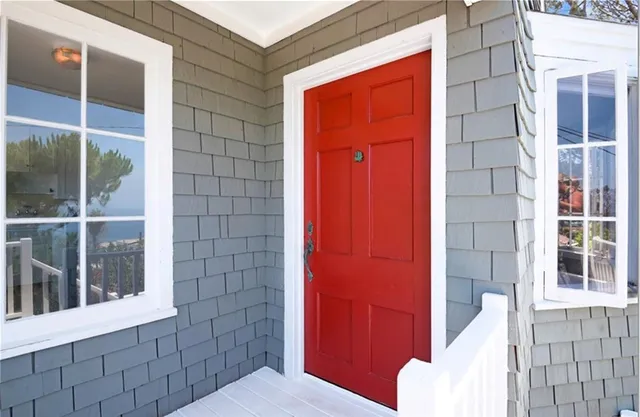 a bathroom with a toilet and shower