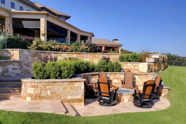 a view of a swimming pool with a patio
