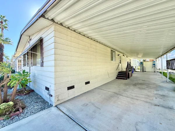 a view of a back yard of the house