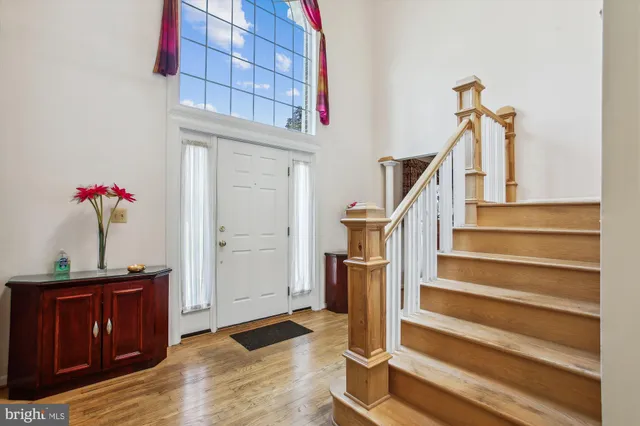 a view of entryway with wooden floor