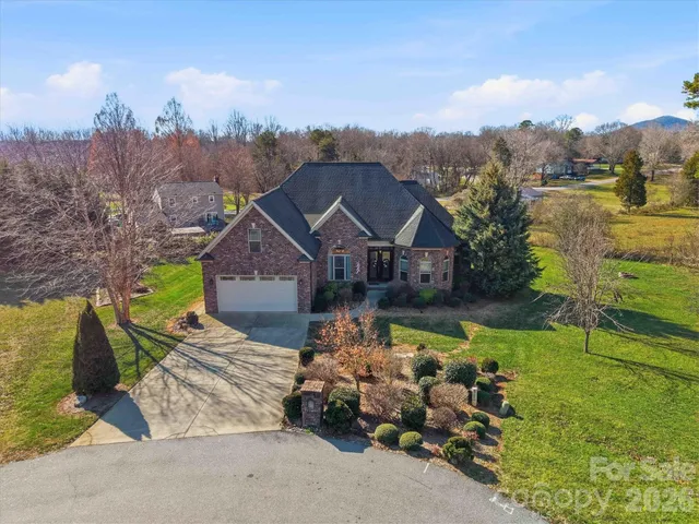 an aerial view of a house with a garden
