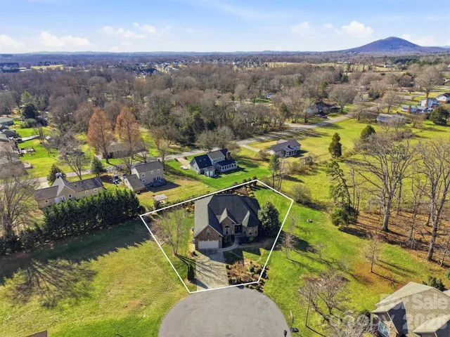 a view of swimming pool with outdoor seating