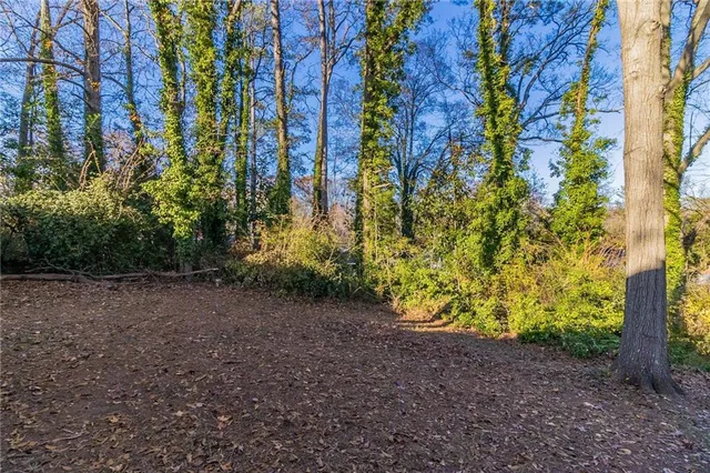 a view of a house with a street