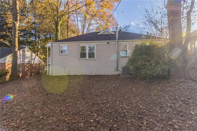 a view of a backyard of the house