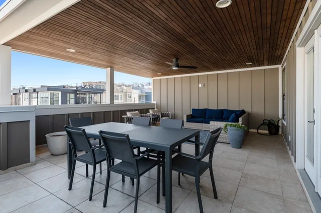 a view of an empty room with wooden walls