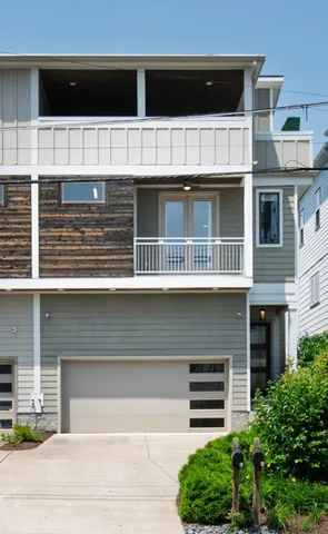 a car parked in front of a house