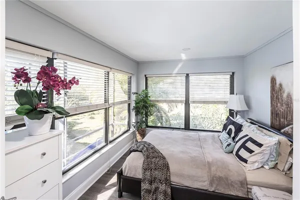 an aerial view of a house with a ocean view