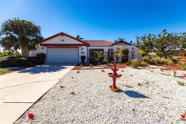 a front view of house with backyard space