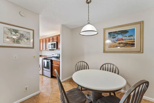 a view of a livingroom with furniture and window