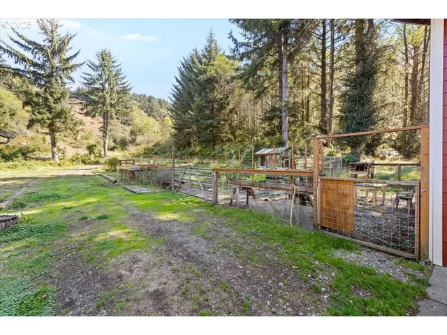 a view of a lake with a yard