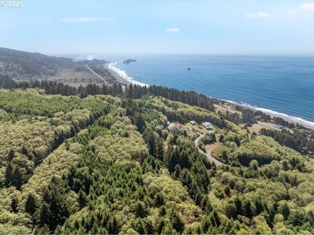 a view of a city with an ocean