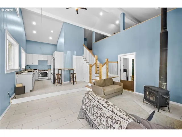 a living room with furniture and a view