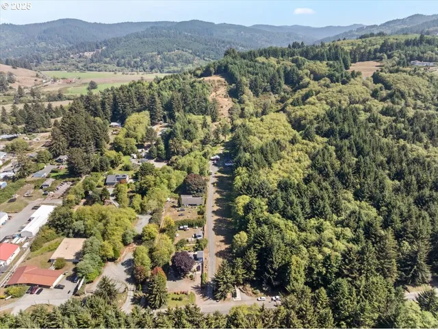 a view of barn with a small yard