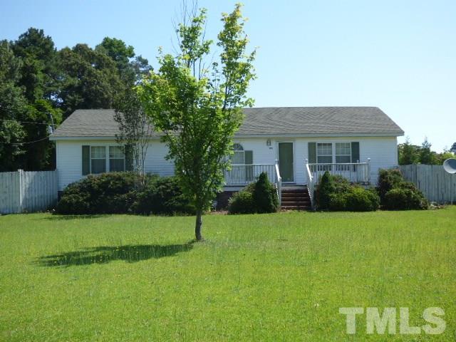3855 Reedy Prong Church Road Dunn, NC 28334 - Photo 24 of 25 a front view of a house with a yard