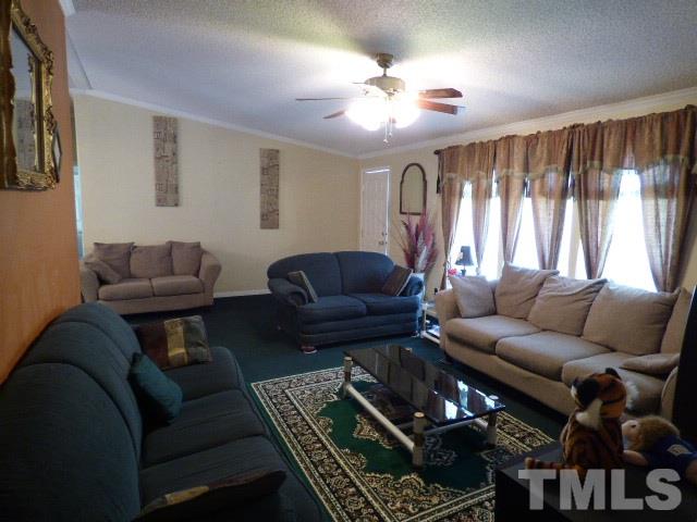 3855 Reedy Prong Church Road Dunn, NC 28334 - Photo 6 of 25 a living room with furniture and a large window