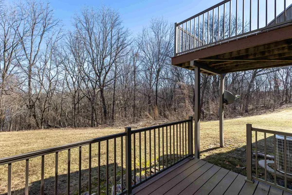 a view of a house with a yard and garage