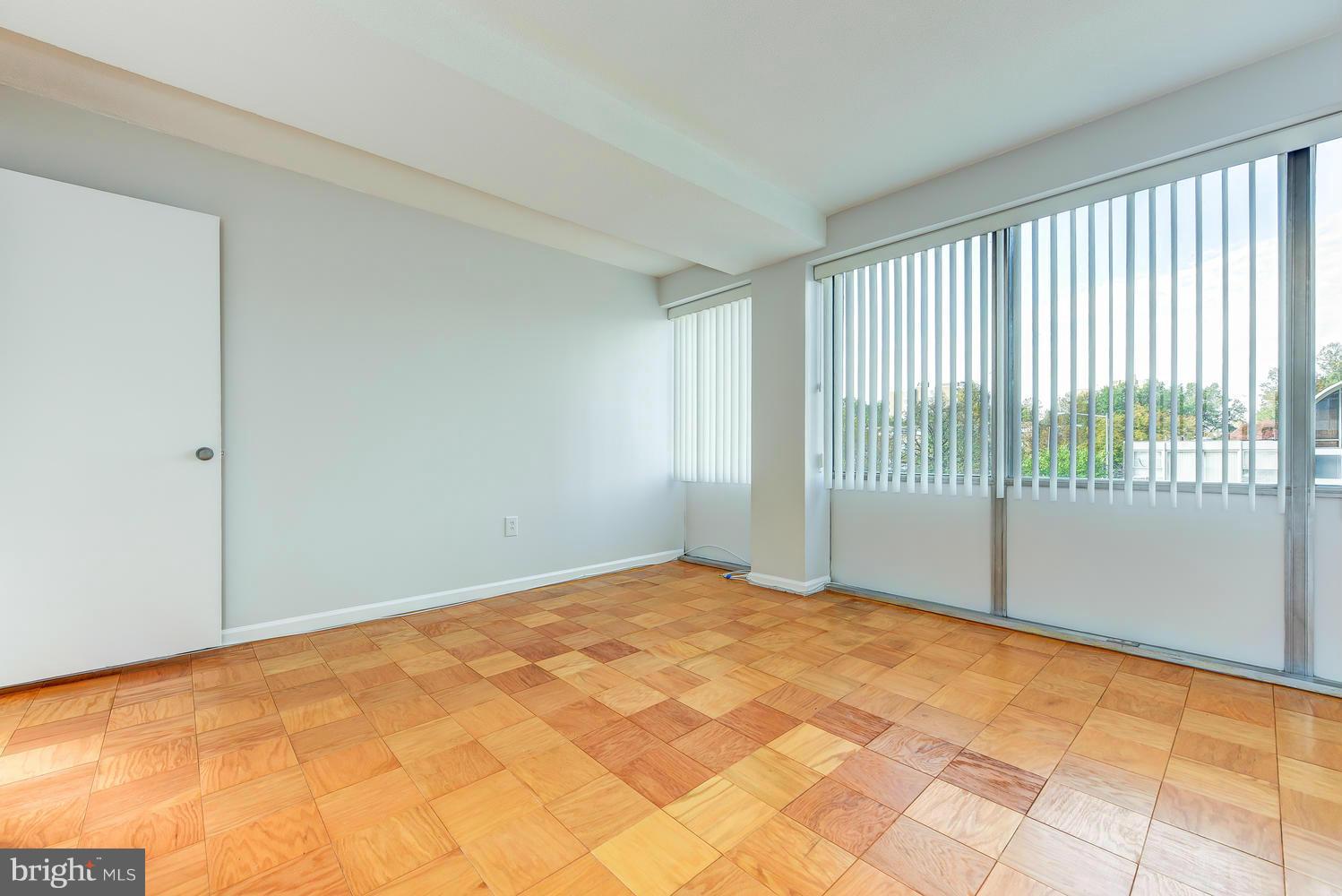 1311 Delaware Avenue Southwest, Unit S131 Washington, DC 20024 - Photo 15 of 18 a view of an empty room and window