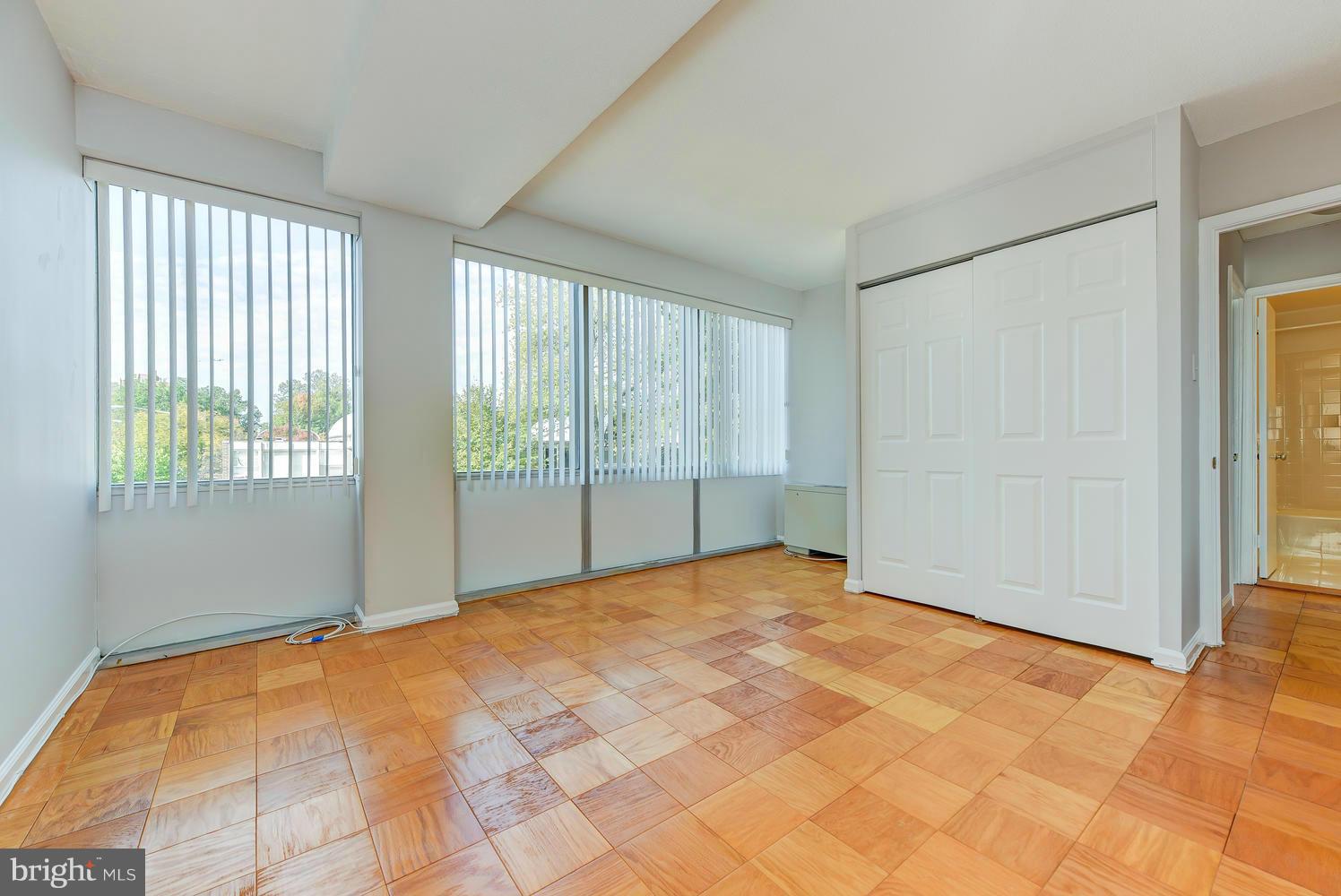 1311 Delaware Avenue Southwest, Unit S131 Washington, DC 20024 - Photo 16 of 18 a view of an empty room with a window