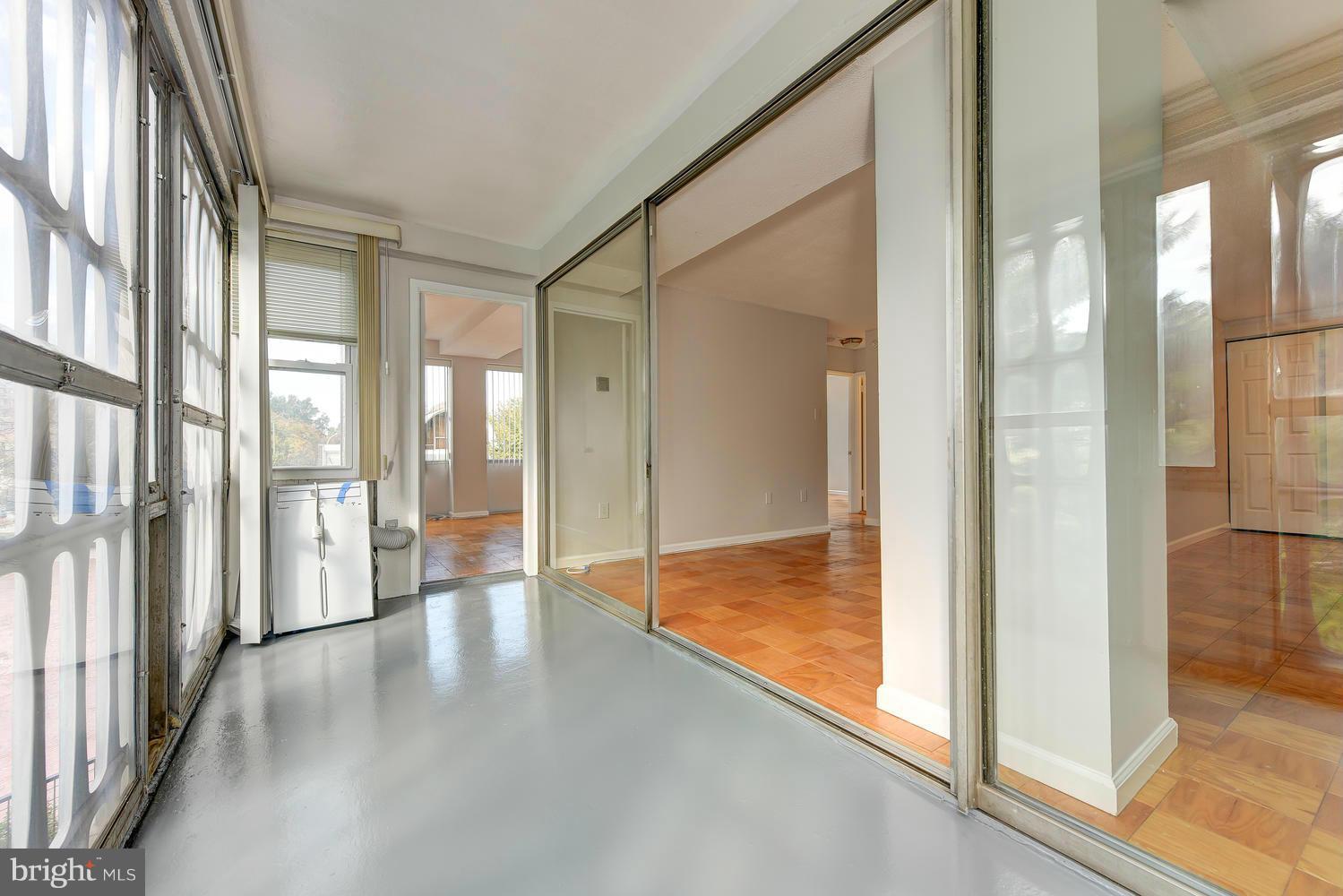 1311 Delaware Avenue Southwest, Unit S131 Washington, DC 20024 - Photo 7 of 18 a view of an entryway with wooden floor