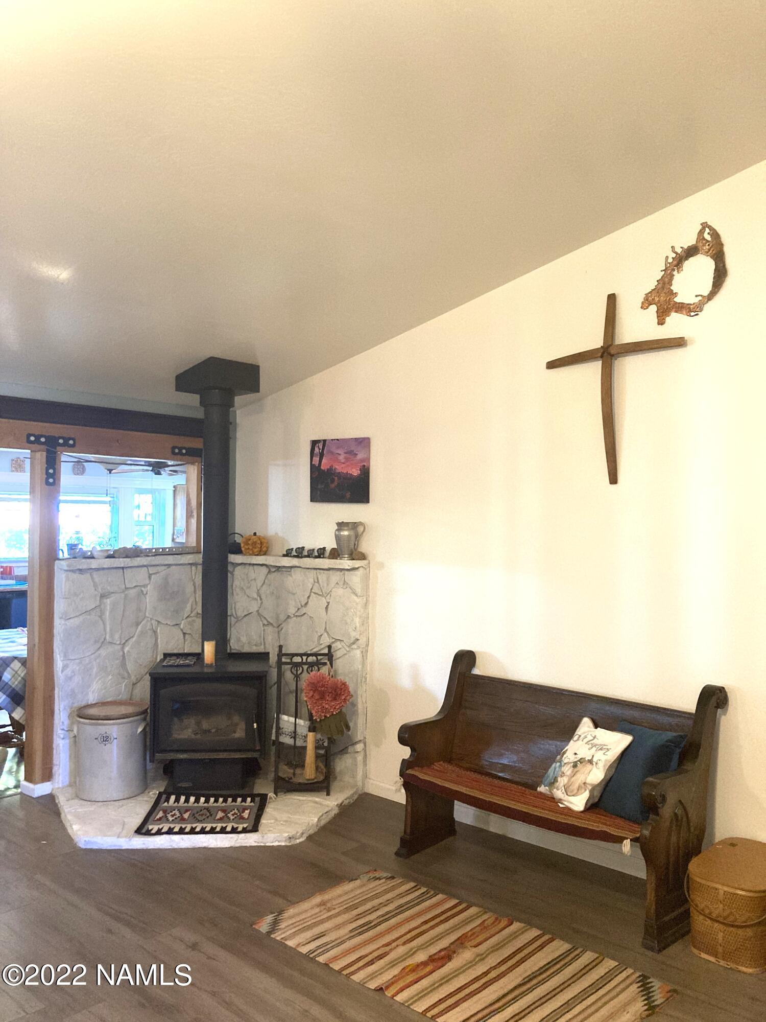 9682 Pioneer Valley Road Flagstaff, AZ 86004 - Photo 13 of 43 woodburning stove
