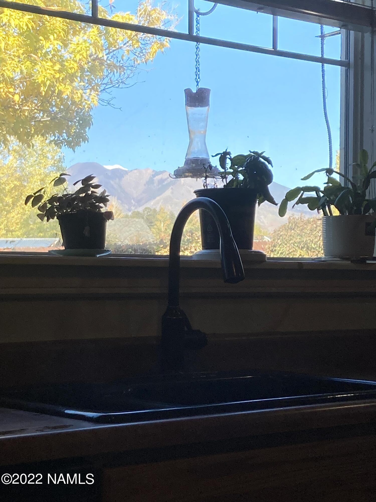 9682 Pioneer Valley Road Flagstaff, AZ 86004 - Photo 14 of 43 kitchen view Peaks!