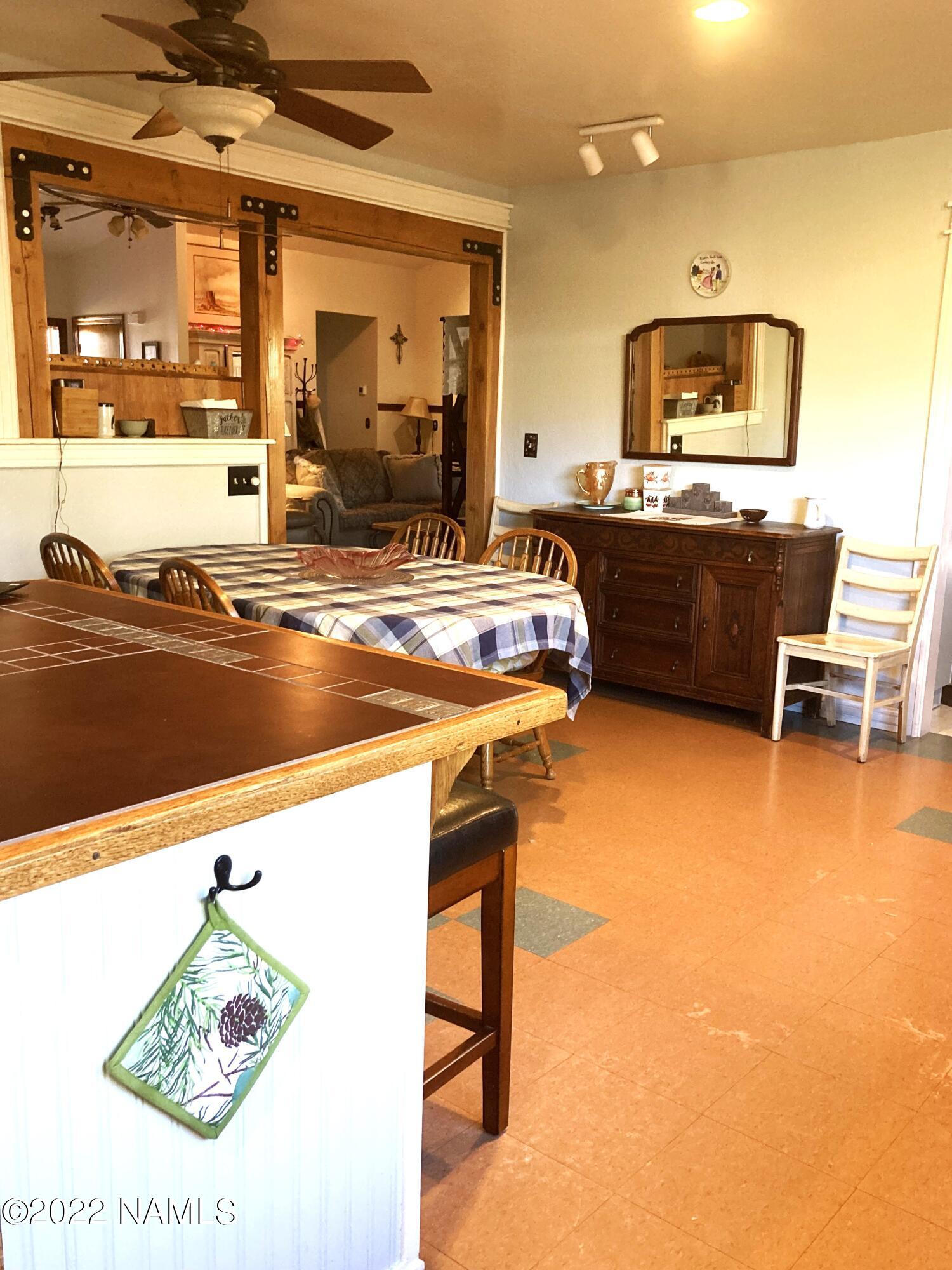 9682 Pioneer Valley Road Flagstaff, AZ 86004 - Photo 18 of 43 kitchen to living rm