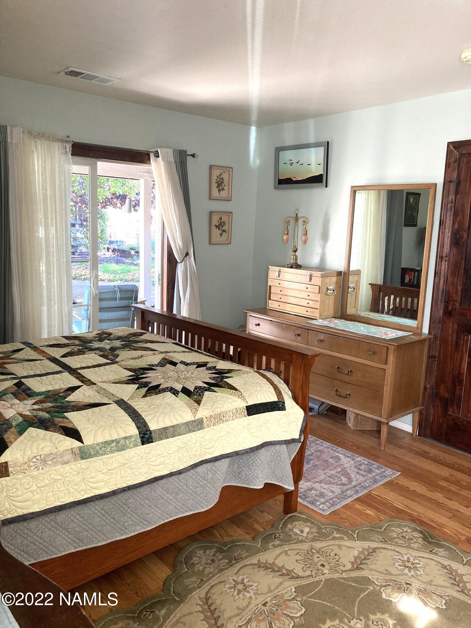 9682 Pioneer Valley Road Flagstaff, AZ 86004 - Photo 23 of 43 Master sliding patio door