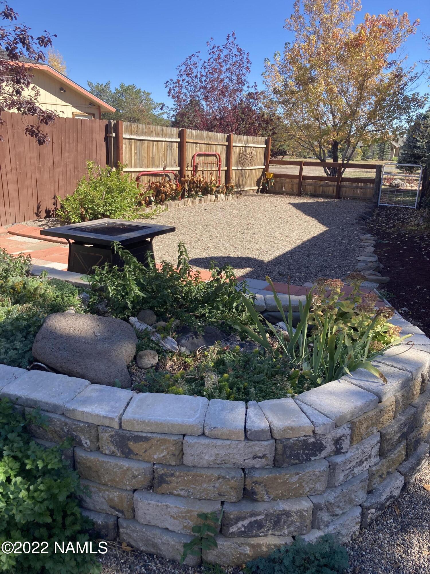 9682 Pioneer Valley Road Flagstaff, AZ 86004 - Photo 36 of 43 backyard northside