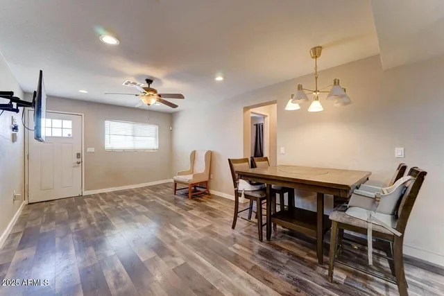 a view of a dining room with furniture