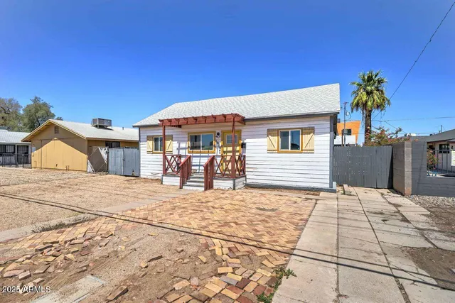 a view of a house with a patio